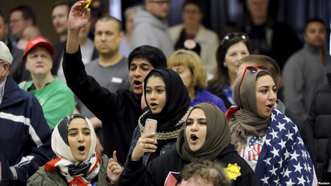FILE - Young Muslims speak out during a campaign rally in Wichita, Kansas, March 5, 2016.